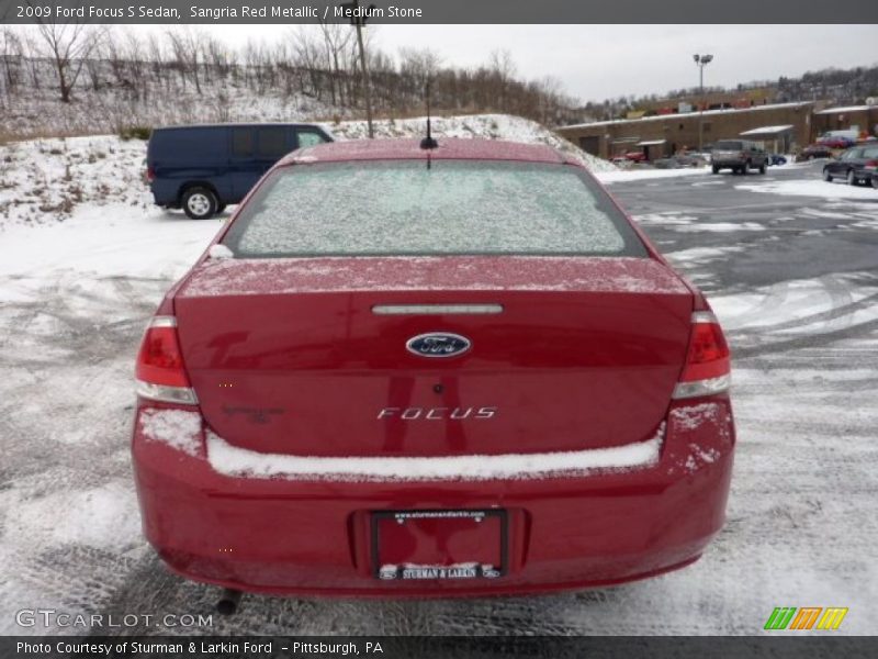 Sangria Red Metallic / Medium Stone 2009 Ford Focus S Sedan