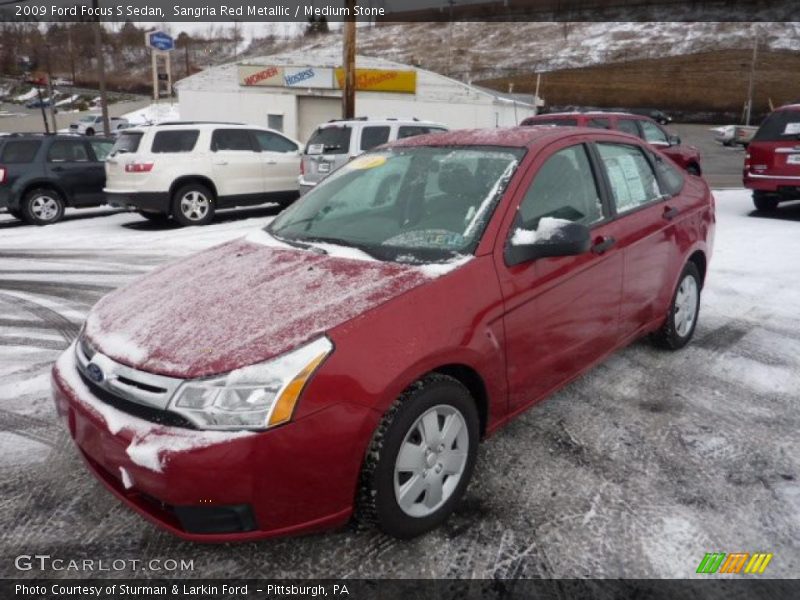 Sangria Red Metallic / Medium Stone 2009 Ford Focus S Sedan