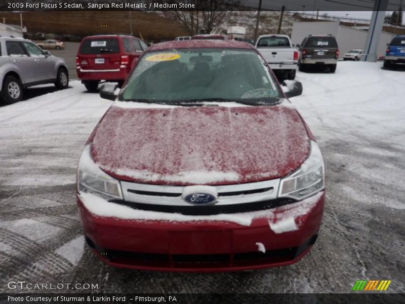 Sangria Red Metallic / Medium Stone 2009 Ford Focus S Sedan