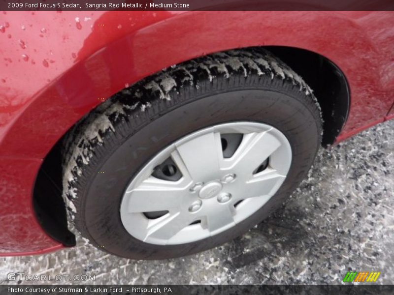 Sangria Red Metallic / Medium Stone 2009 Ford Focus S Sedan