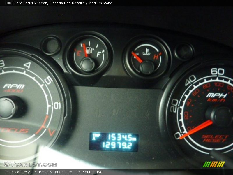 Sangria Red Metallic / Medium Stone 2009 Ford Focus S Sedan