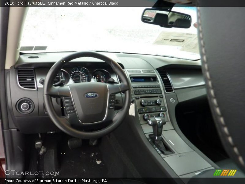 Cinnamon Red Metallic / Charcoal Black 2010 Ford Taurus SEL
