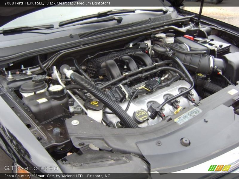 Black Clearcoat / Medium Light Stone 2008 Ford Taurus SEL