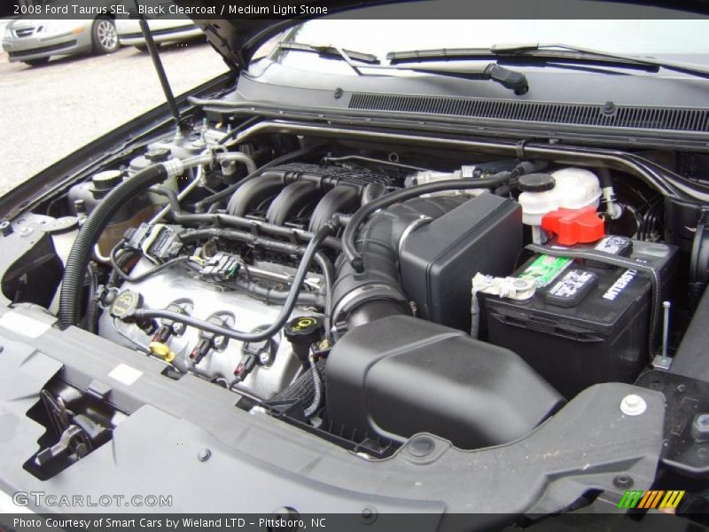 Black Clearcoat / Medium Light Stone 2008 Ford Taurus SEL
