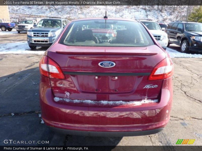 Bright Magenta Metallic / Charcoal Black/Blue Cloth 2011 Ford Fiesta SE Sedan