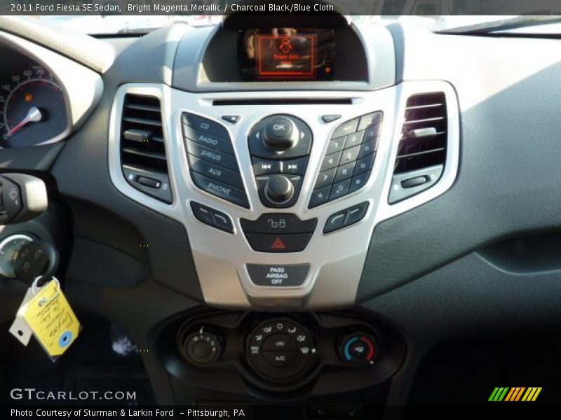 Bright Magenta Metallic / Charcoal Black/Blue Cloth 2011 Ford Fiesta SE Sedan