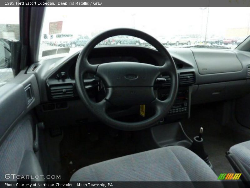 Deep Iris Metallic / Gray 1995 Ford Escort LX Sedan
