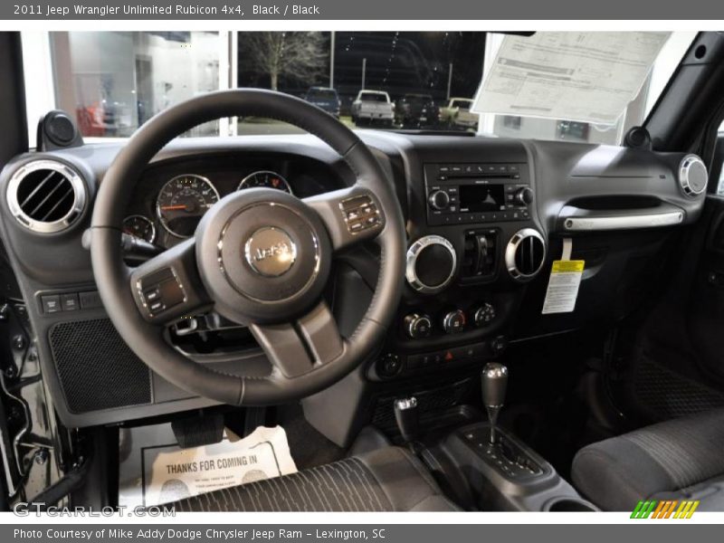 Black / Black 2011 Jeep Wrangler Unlimited Rubicon 4x4