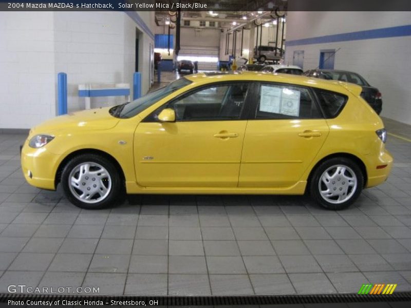 Solar Yellow Mica / Black/Blue 2004 Mazda MAZDA3 s Hatchback