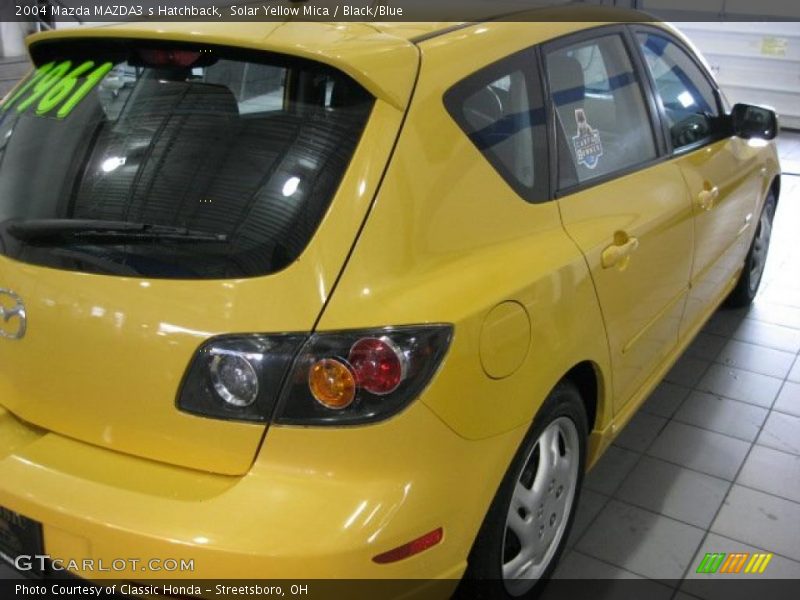 Solar Yellow Mica / Black/Blue 2004 Mazda MAZDA3 s Hatchback