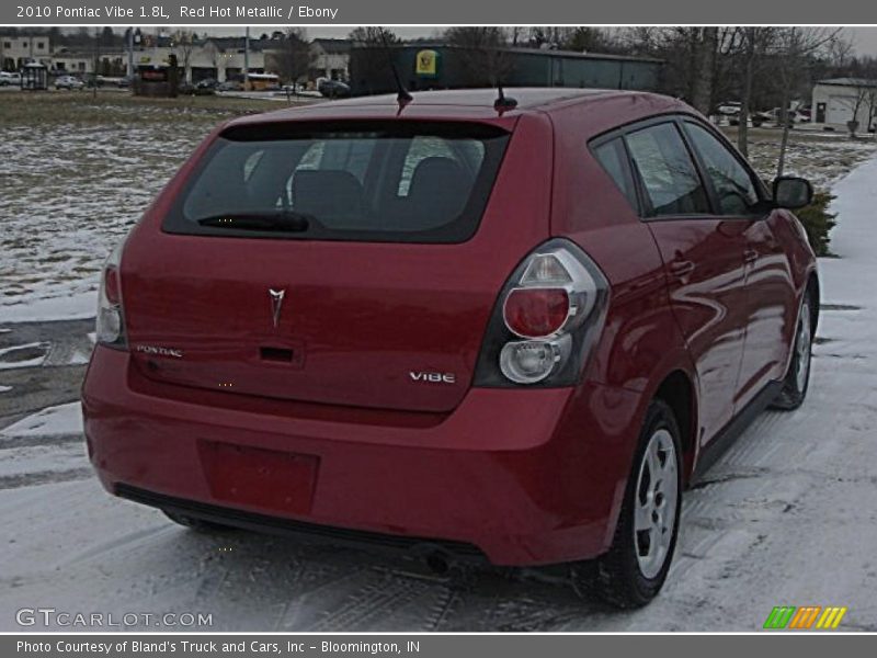 Red Hot Metallic / Ebony 2010 Pontiac Vibe 1.8L