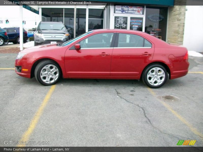 Sangria Red Metallic / Charcoal Black 2010 Ford Fusion SE