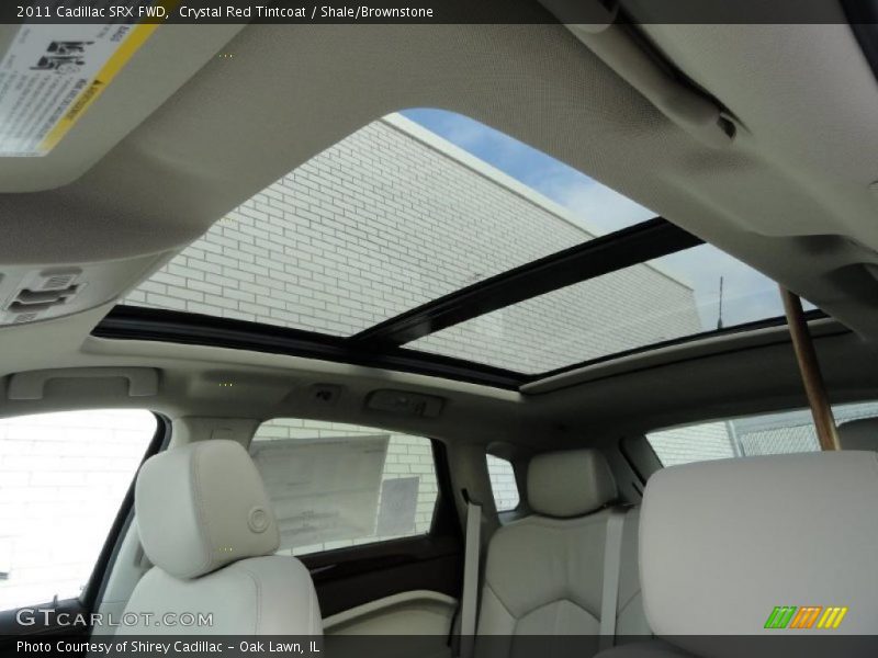 Crystal Red Tintcoat / Shale/Brownstone 2011 Cadillac SRX FWD