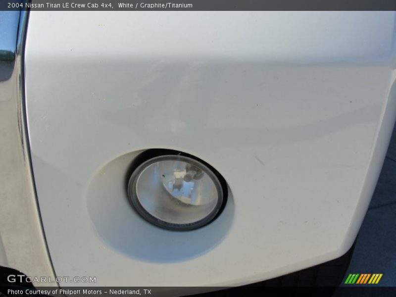 White / Graphite/Titanium 2004 Nissan Titan LE Crew Cab 4x4