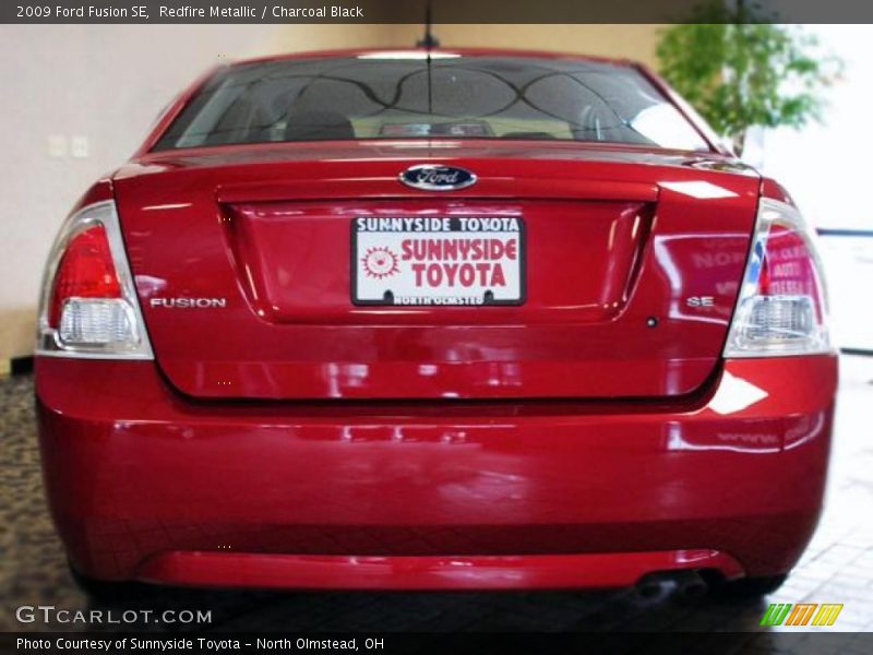 Redfire Metallic / Charcoal Black 2009 Ford Fusion SE