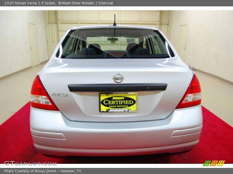 Brilliant Silver Metallic / Charcoal 2010 Nissan Versa 1.6 Sedan