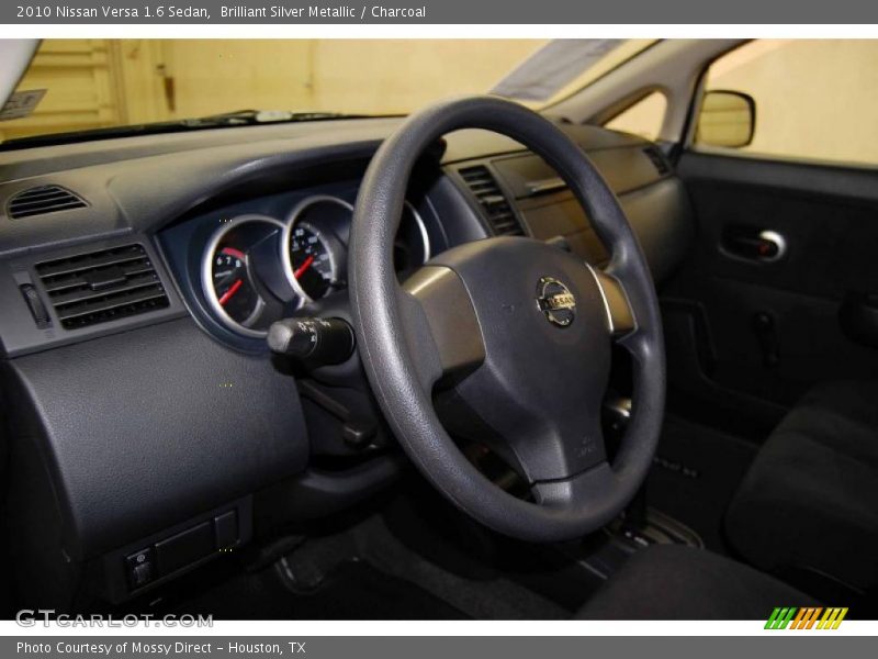 Brilliant Silver Metallic / Charcoal 2010 Nissan Versa 1.6 Sedan
