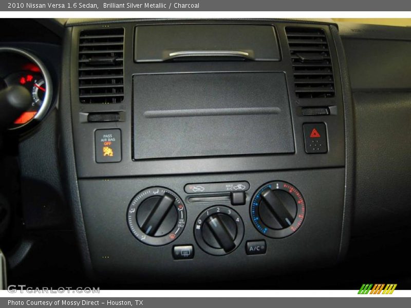 Brilliant Silver Metallic / Charcoal 2010 Nissan Versa 1.6 Sedan