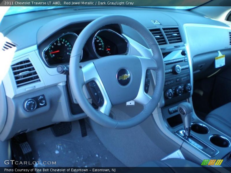 Red Jewel Metallic / Dark Gray/Light Gray 2011 Chevrolet Traverse LT AWD