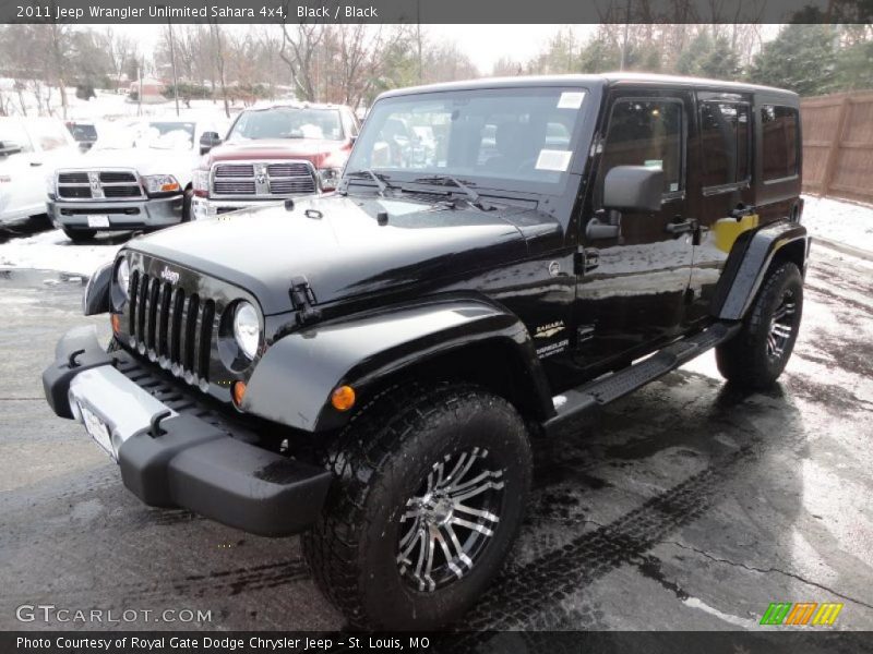 Front 3/4 View of 2011 Wrangler Unlimited Sahara 4x4
