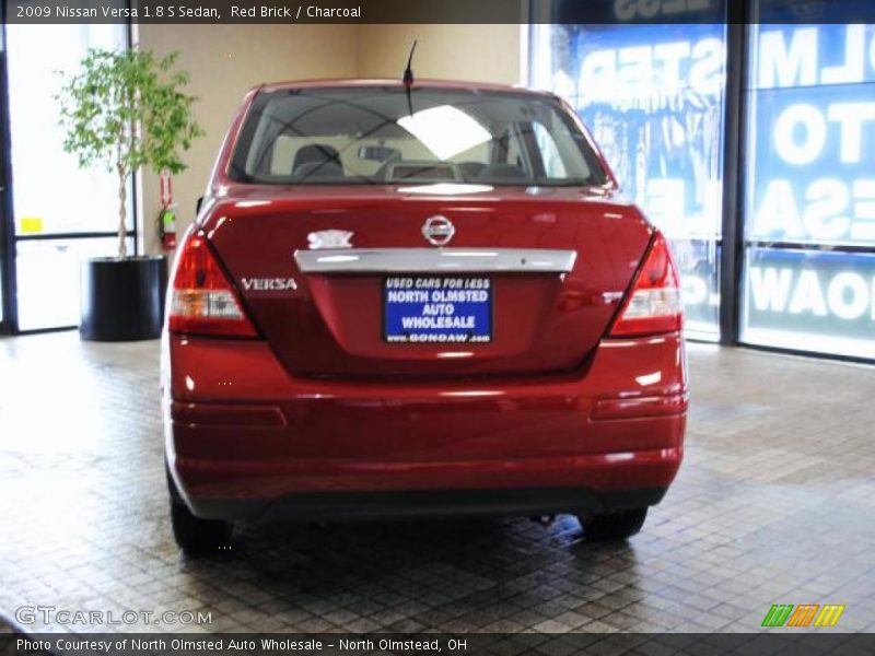 Red Brick / Charcoal 2009 Nissan Versa 1.8 S Sedan