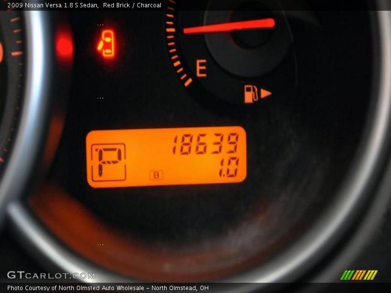 Red Brick / Charcoal 2009 Nissan Versa 1.8 S Sedan