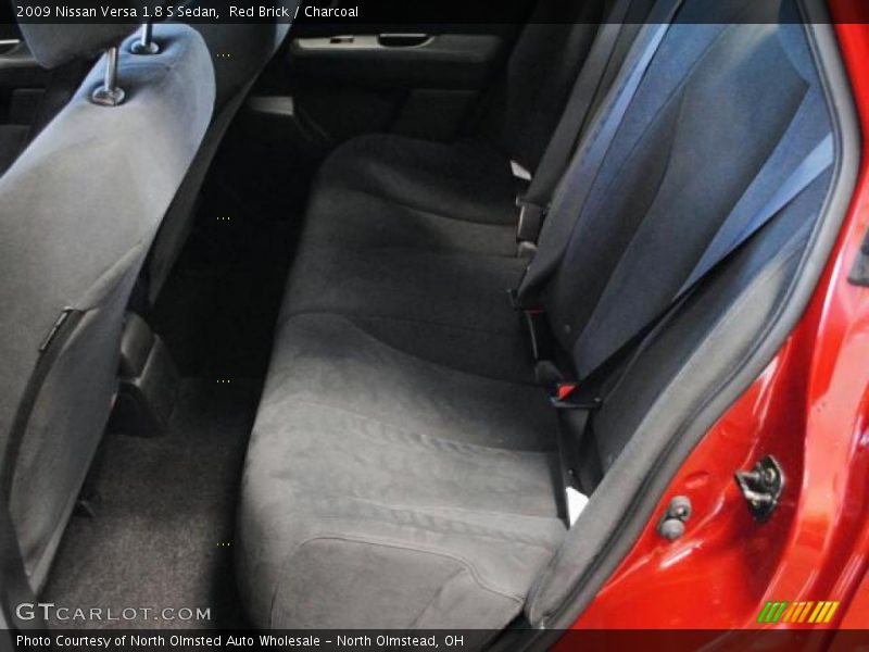 Red Brick / Charcoal 2009 Nissan Versa 1.8 S Sedan