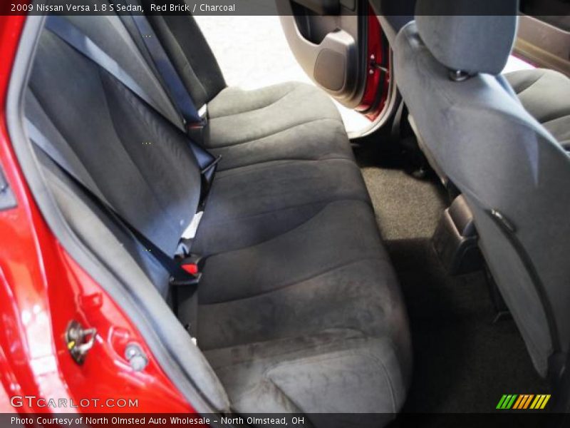 Red Brick / Charcoal 2009 Nissan Versa 1.8 S Sedan