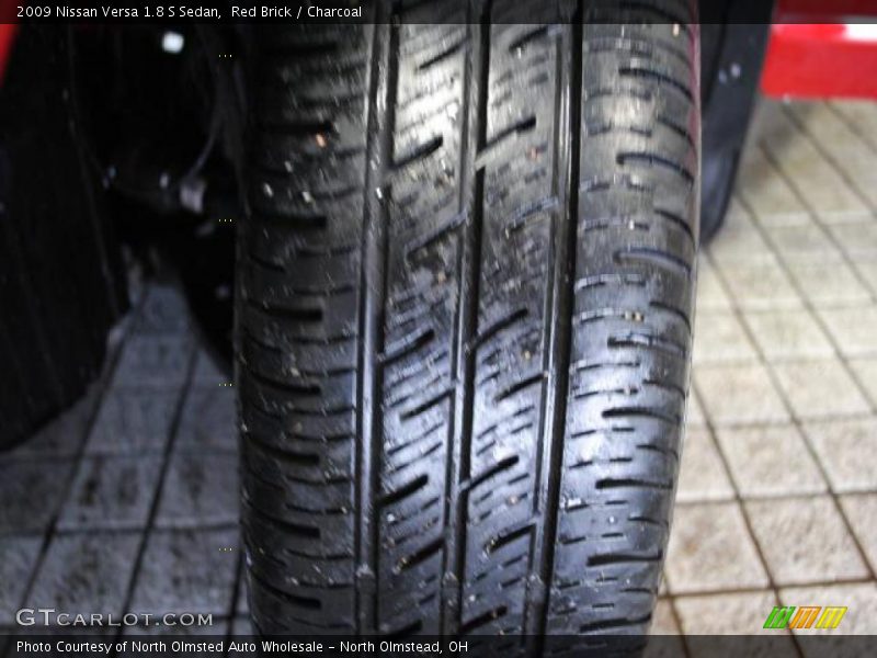 Red Brick / Charcoal 2009 Nissan Versa 1.8 S Sedan