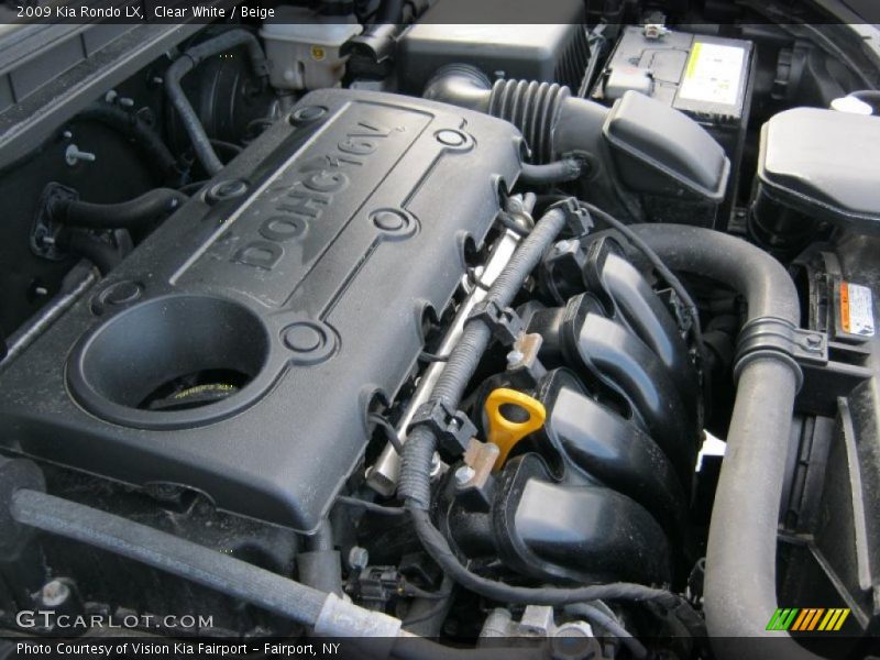 Clear White / Beige 2009 Kia Rondo LX