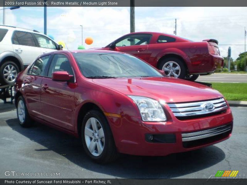 Redfire Metallic / Medium Light Stone 2009 Ford Fusion SE V6