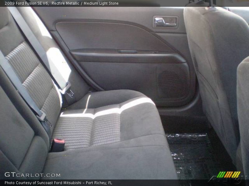 Redfire Metallic / Medium Light Stone 2009 Ford Fusion SE V6