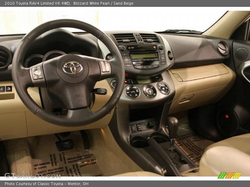 Blizzard White Pearl / Sand Beige 2010 Toyota RAV4 Limited V6 4WD