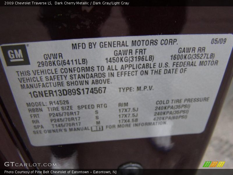 Dark Cherry Metallic / Dark Gray/Light Gray 2009 Chevrolet Traverse LS