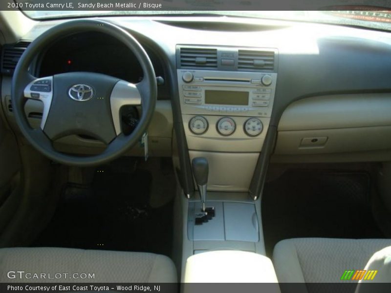 Sandy Beach Metallic / Bisque 2010 Toyota Camry LE