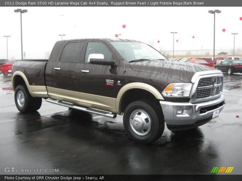 Front 3/4 View of 2011 Ram 3500 HD Laramie Mega Cab 4x4 Dually