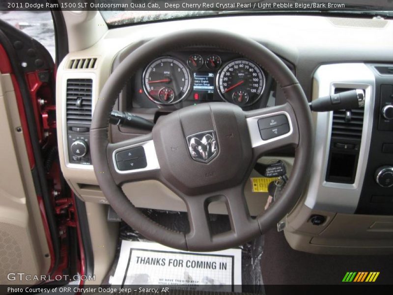 Deep Cherry Red Crystal Pearl / Light Pebble Beige/Bark Brown 2011 Dodge Ram 1500 SLT Outdoorsman Quad Cab