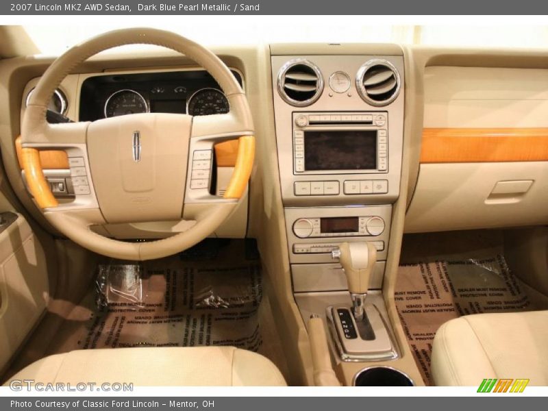 Dark Blue Pearl Metallic / Sand 2007 Lincoln MKZ AWD Sedan