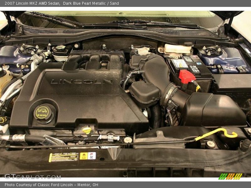 Dark Blue Pearl Metallic / Sand 2007 Lincoln MKZ AWD Sedan