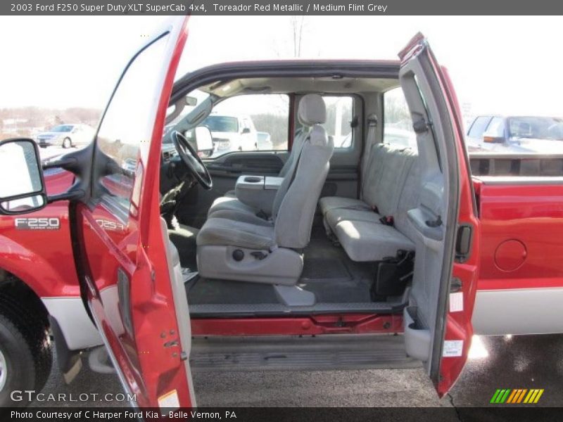 Toreador Red Metallic / Medium Flint Grey 2003 Ford F250 Super Duty XLT SuperCab 4x4