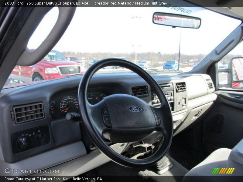 Toreador Red Metallic / Medium Flint Grey 2003 Ford F250 Super Duty XLT SuperCab 4x4