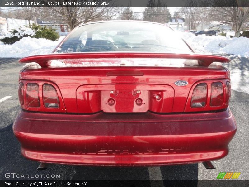 Laser Red Metallic / Gray 1995 Ford Mustang GT Coupe