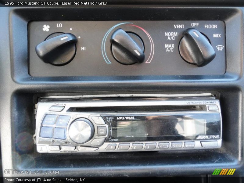 Laser Red Metallic / Gray 1995 Ford Mustang GT Coupe