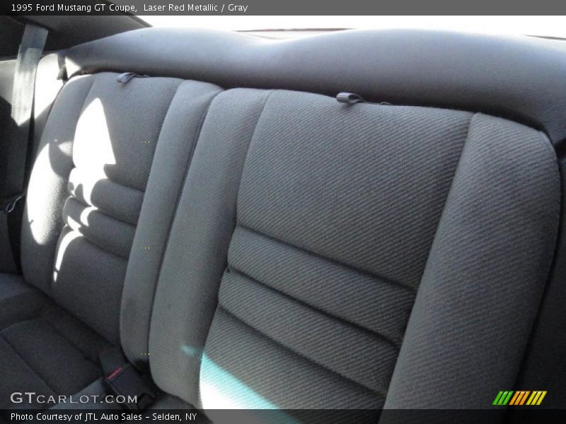 Laser Red Metallic / Gray 1995 Ford Mustang GT Coupe