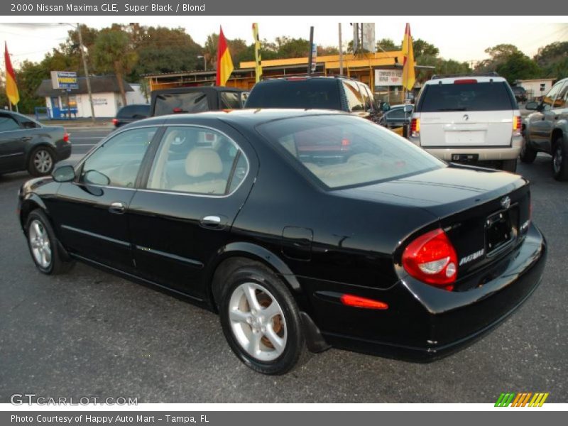 Super Black / Blond 2000 Nissan Maxima GLE