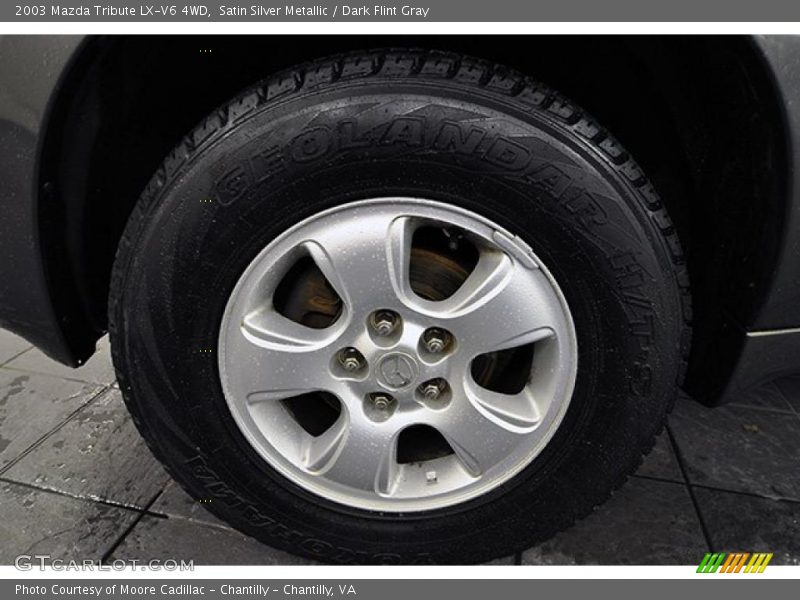  2003 Tribute LX-V6 4WD Wheel