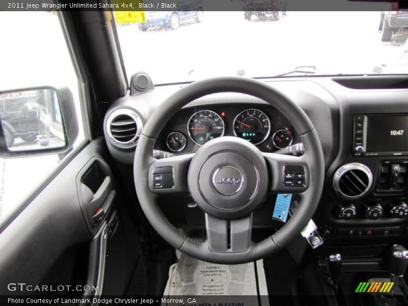 Black / Black 2011 Jeep Wrangler Unlimited Sahara 4x4