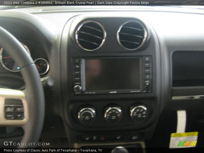 Brilliant Black Crystal Pearl / Dark Slate Gray/Light Pebble Beige 2011 Jeep Compass 2.4 Limited