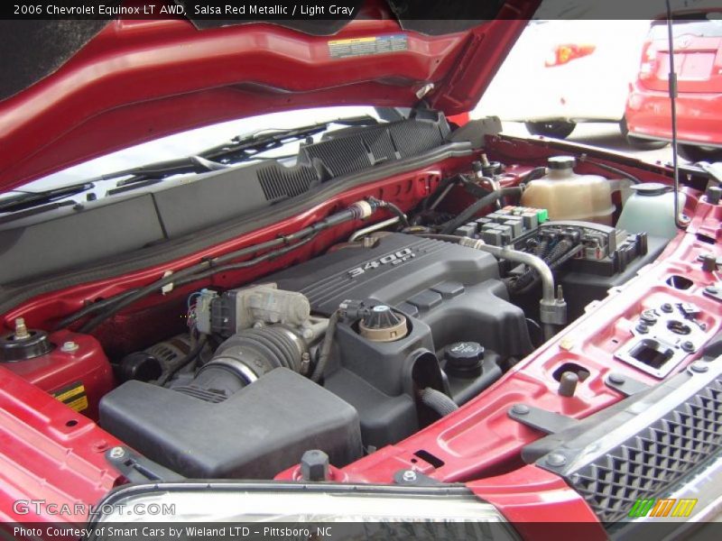 Salsa Red Metallic / Light Gray 2006 Chevrolet Equinox LT AWD