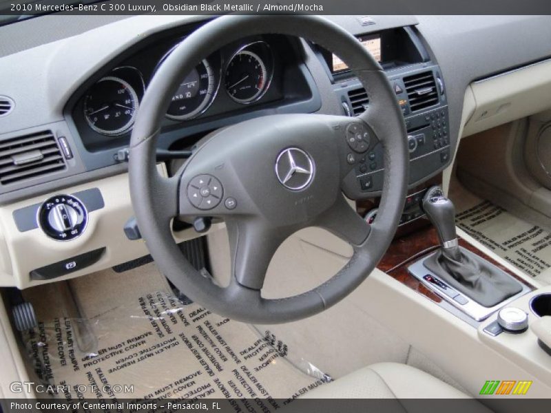Obsidian Black Metallic / Almond/Mocha 2010 Mercedes-Benz C 300 Luxury